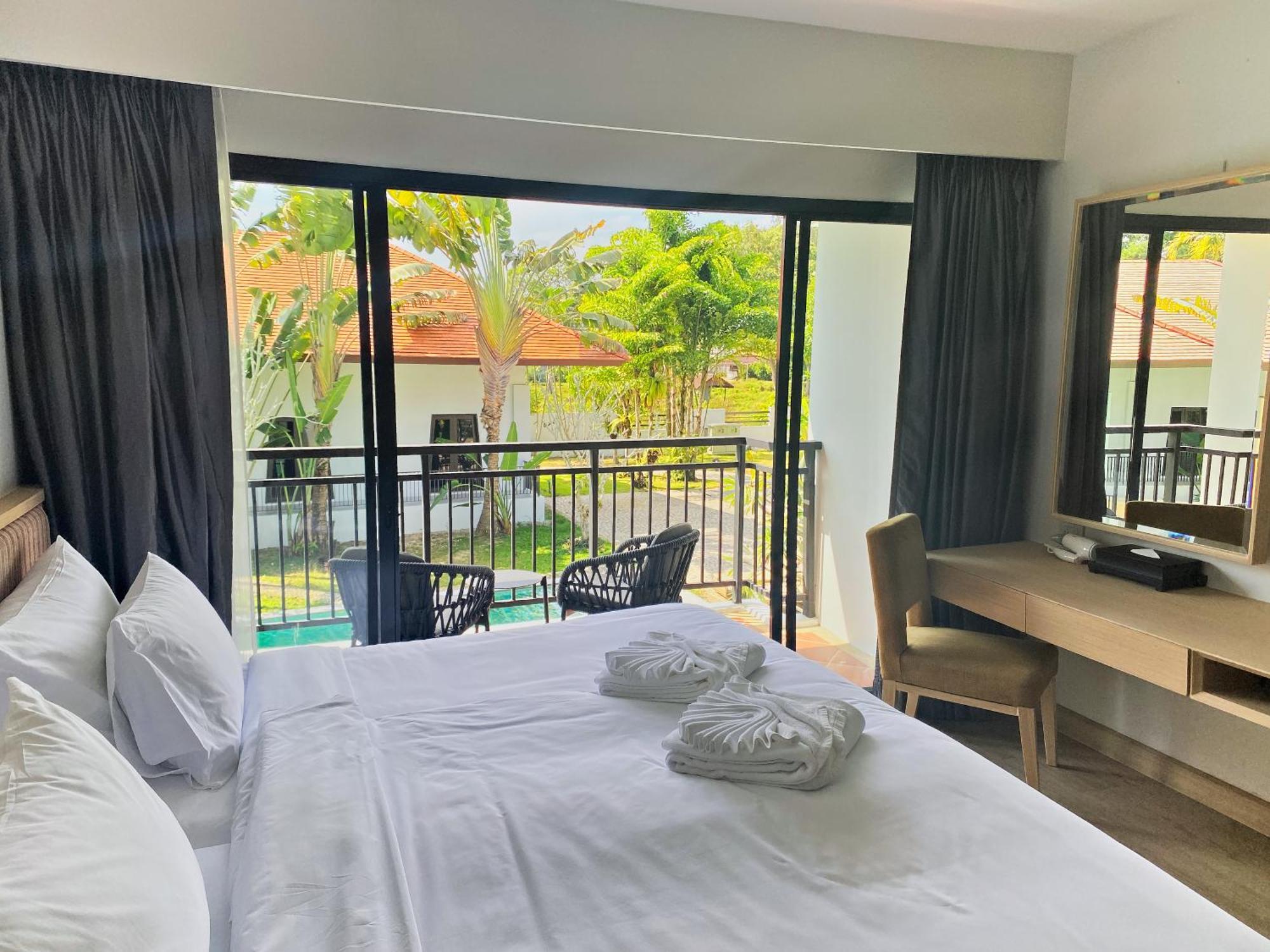 Отель Estella Phuket Майкао-Бич